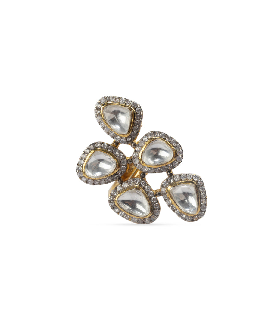 Close-up shot highlighting the Sobia Ring by Vasundhara, crafted with pear-shaped kundan stones in a floral arrangement.