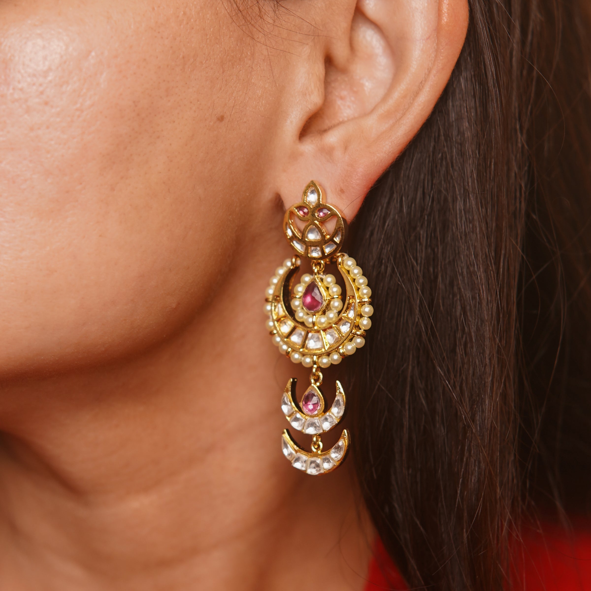 Vibha Earrings from Vasundhara shine bright on the model's ear