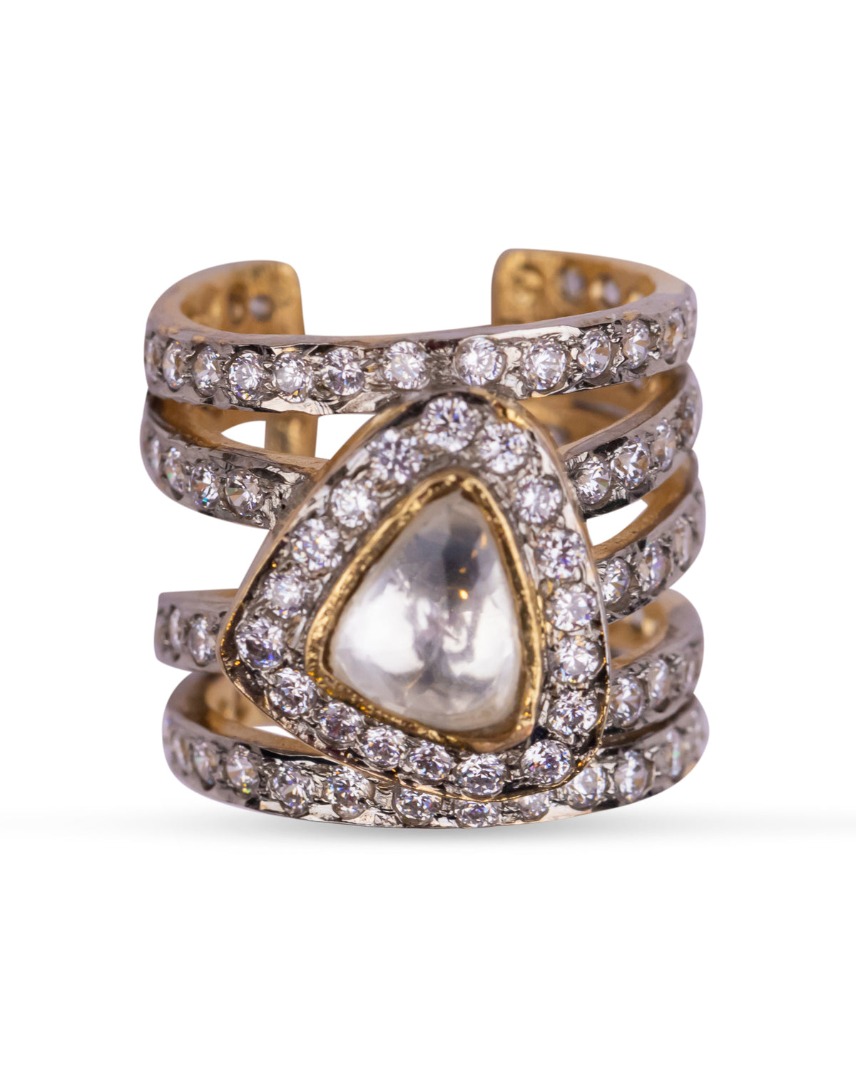 Iqra Ring by Vasundhara featuring layered gold bands with diamond accents and a central kundan stone centerpiece.