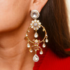Veda Earrings Adorning the Model’s Left Ear with Grace