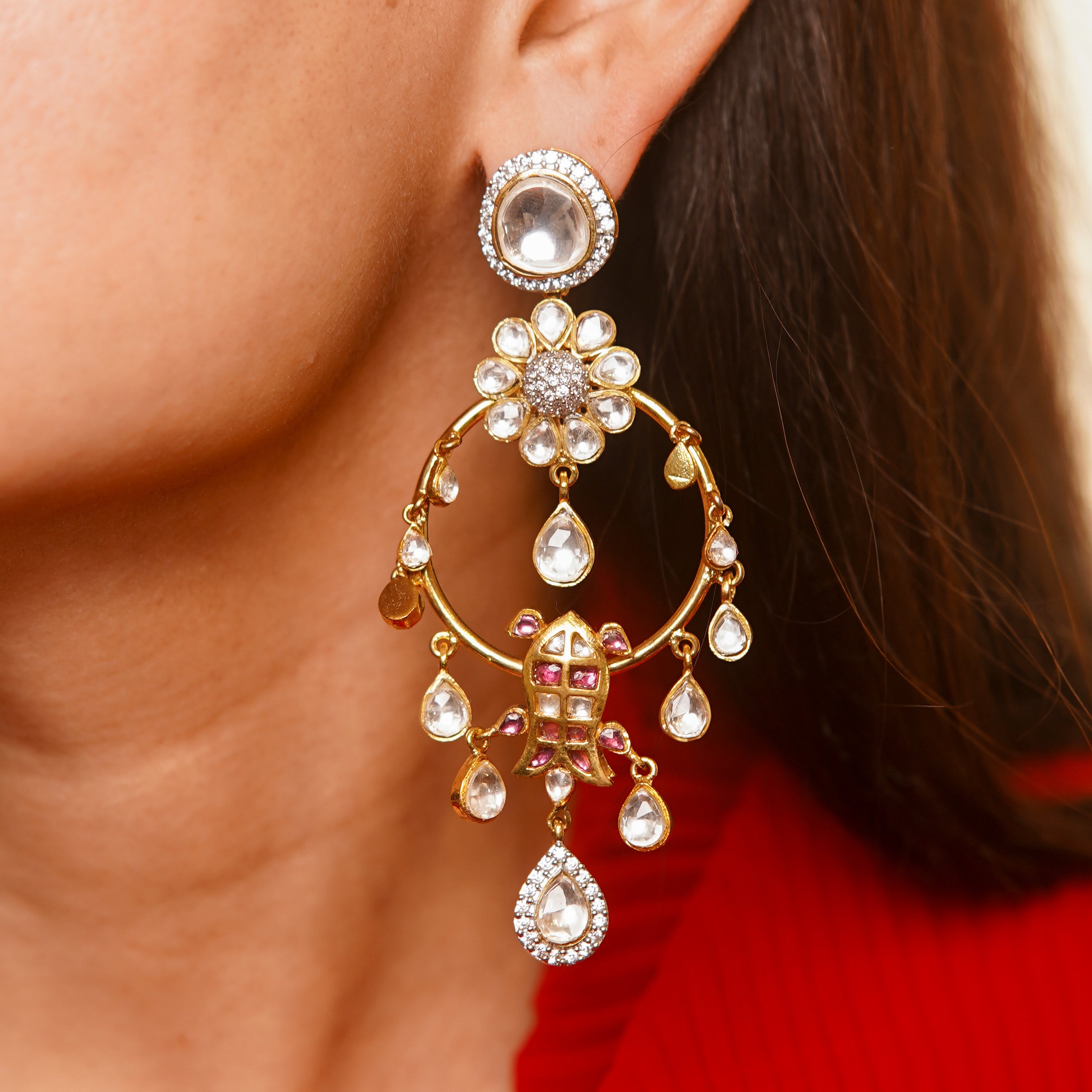 Veda Earrings Adorning the Model’s Left Ear with Grace