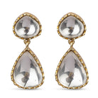 A pair of Rahma Earrings from Vasundhara is displayed on a white background