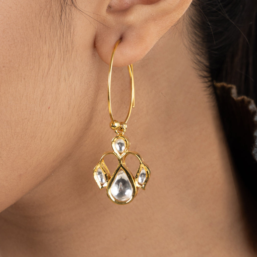 Avika Earrings, a hoop design earrings with stones dropping from it