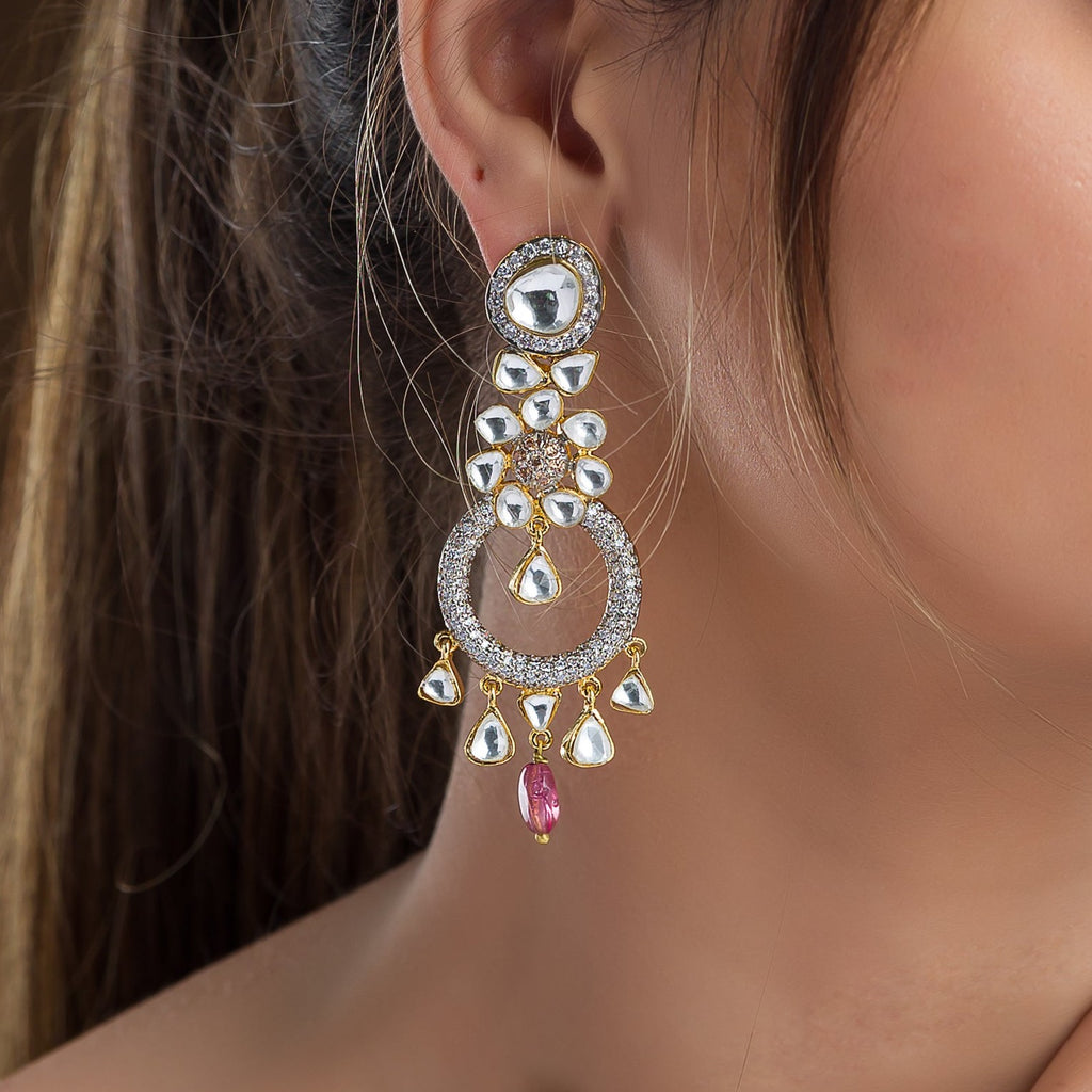 Model Posing with Charulata Earrings from Vasundhara on Her Right Ear