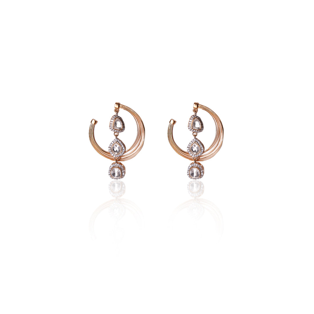 Front-facing Charul hoop earrings with triple teardrop Kundan stones and gold finish on a clean white backdrop