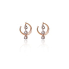 Front-facing Charul hoop earrings with triple teardrop Kundan stones and gold finish on a clean white backdrop