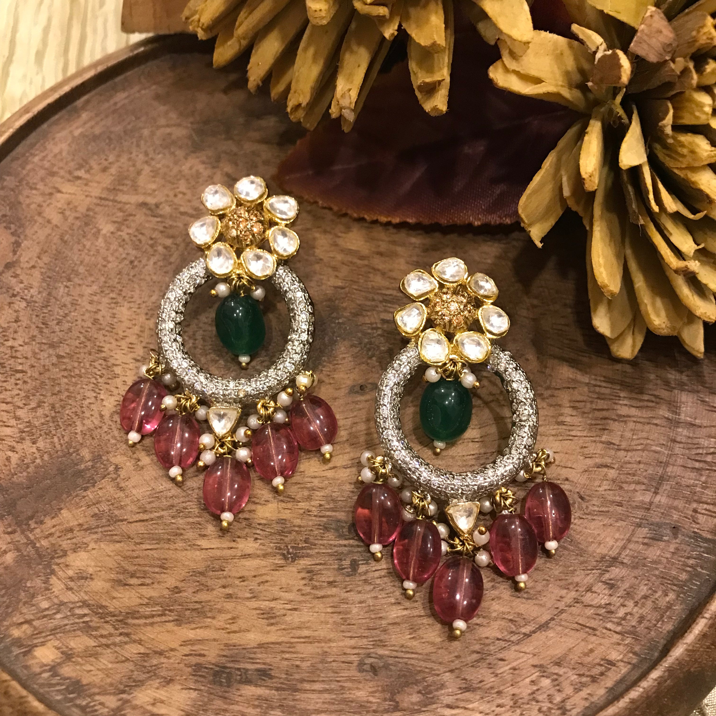 A pair of Nadira Earrings is showcased in the picture 