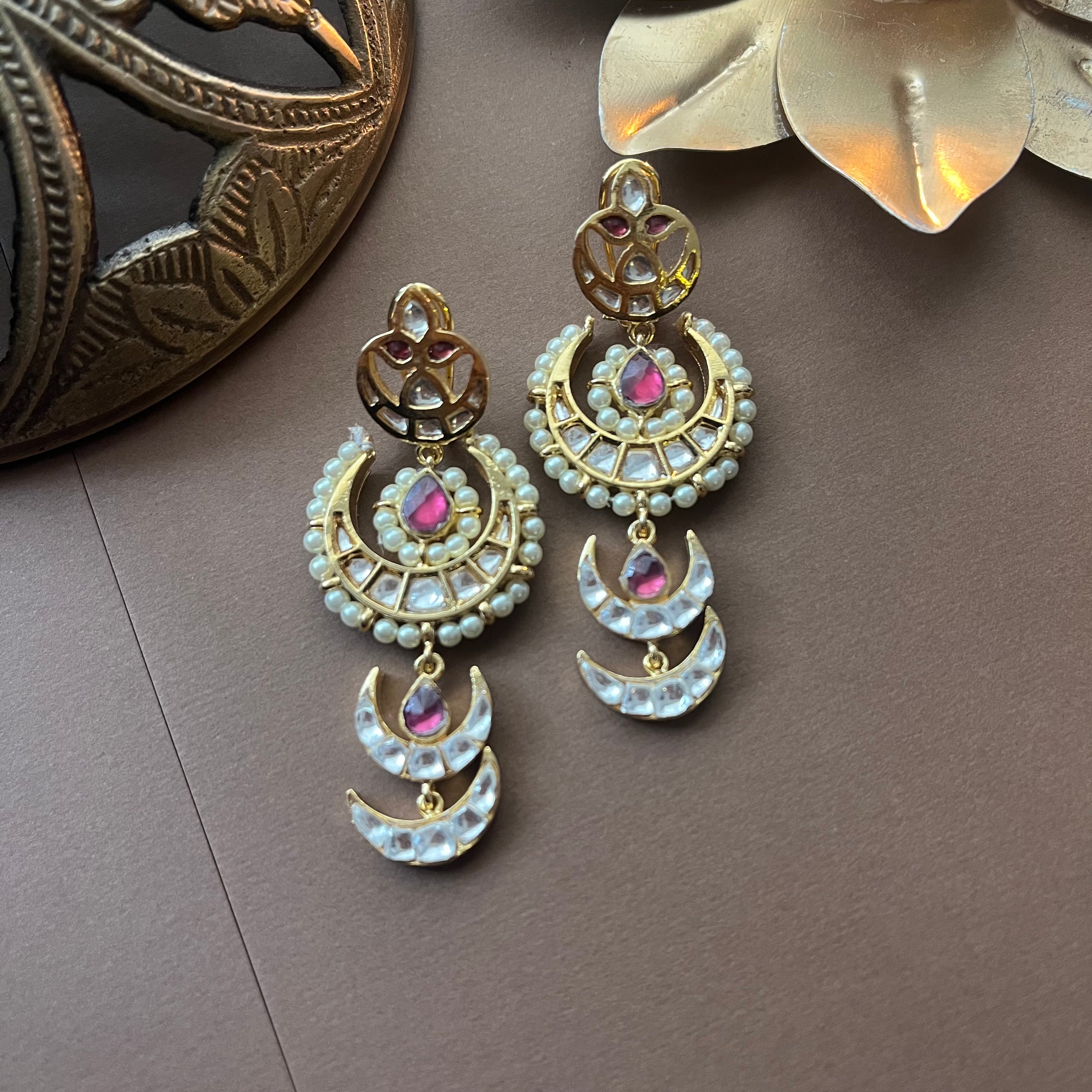 The Graceful Charm of Vibha Earrings on designer canvas 