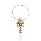 Detailed shot of Narmada Necklace by Vasundhara with kundan, pearls, and vibrant accents, captured on white background.