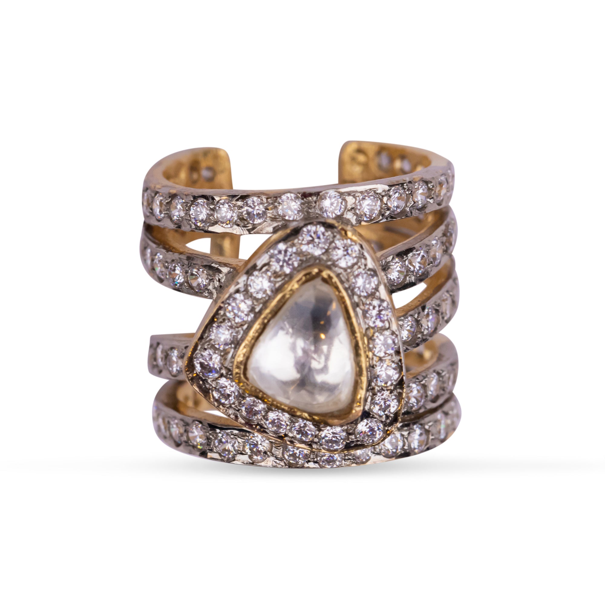Iqra Ring by Vasundhara featuring layered gold bands with diamond accents and a central kundan stone centerpiece.